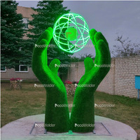 Фигура из искусственной травы - Ладони со световым шаром и логотипом